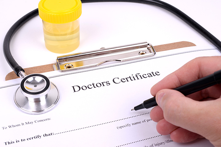 Doctors certificate being filled out