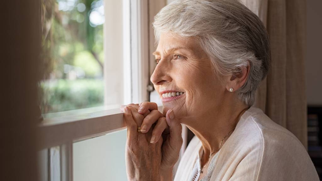 woman thinking about cremation or burial 