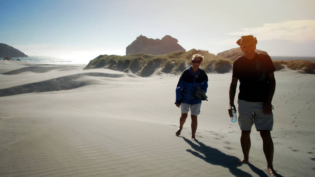 retired couple on beach in New Zealand