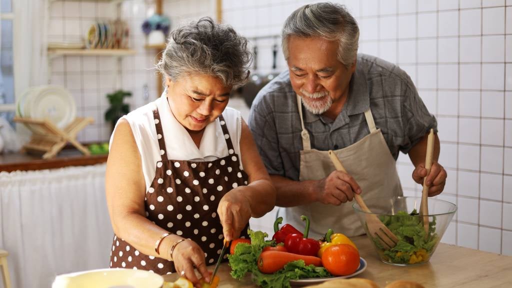 Couple prepare healthy food together