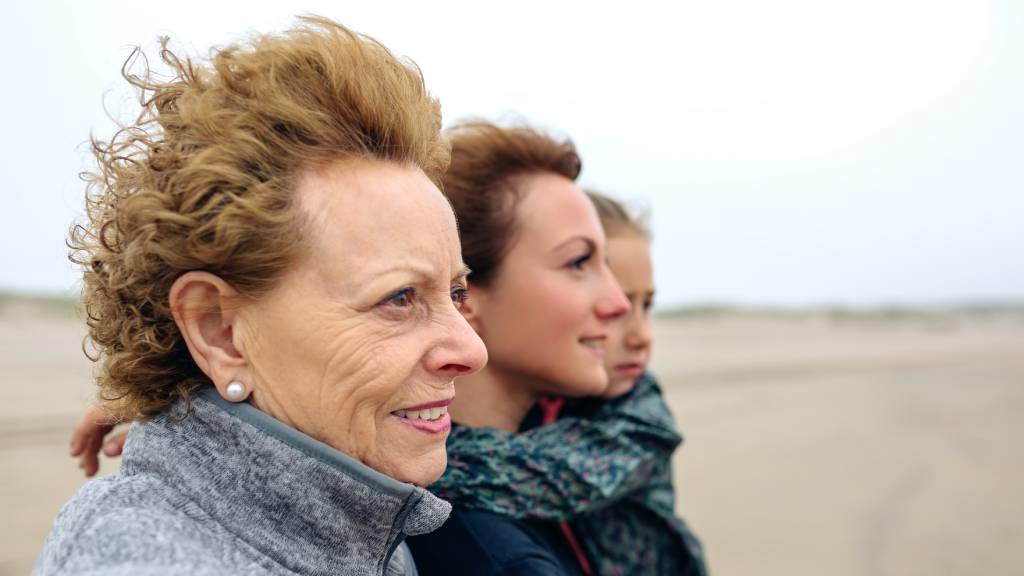 mother, daughter and granddaughter discussing eulogy 