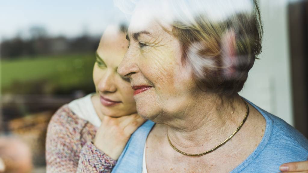 mother and daughter talking about burial or cremation