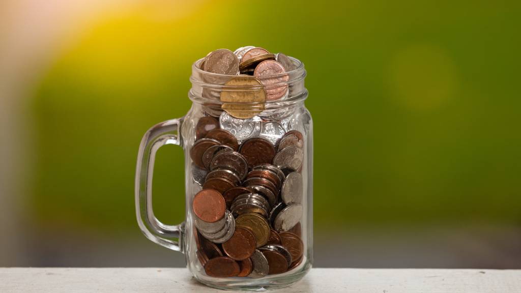 a jar of loose coins 