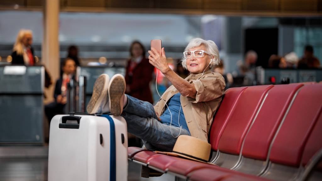 Woman relaxes at airport before flight