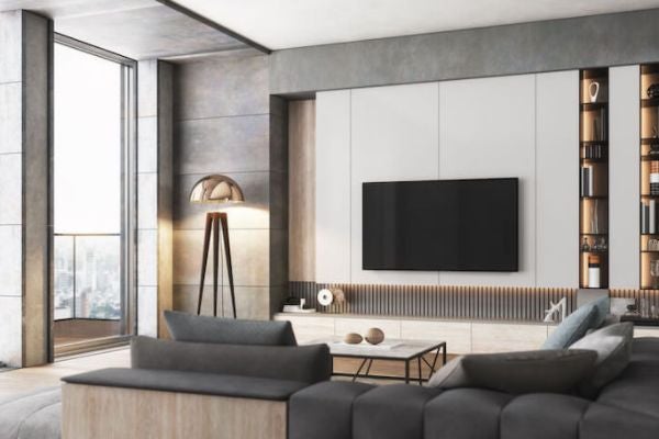 客廳主牆與電視櫃結合，兼具實用與裝飾美感的電視牆設計