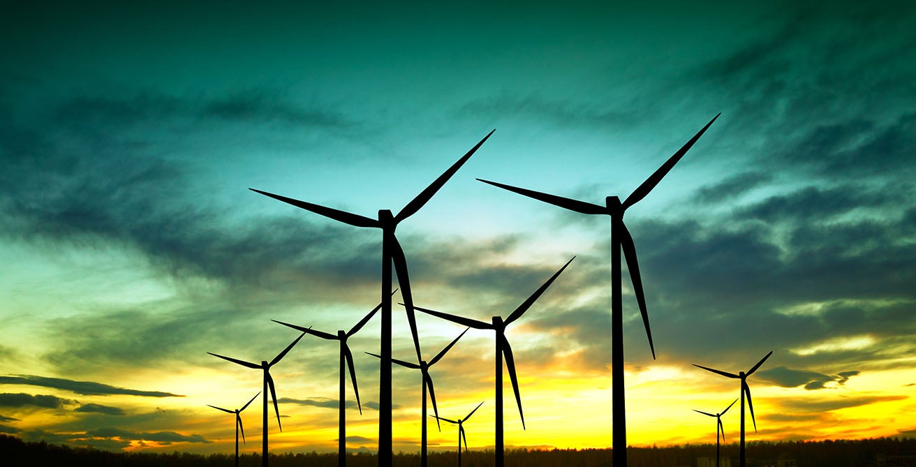 Wind turbines at sunset