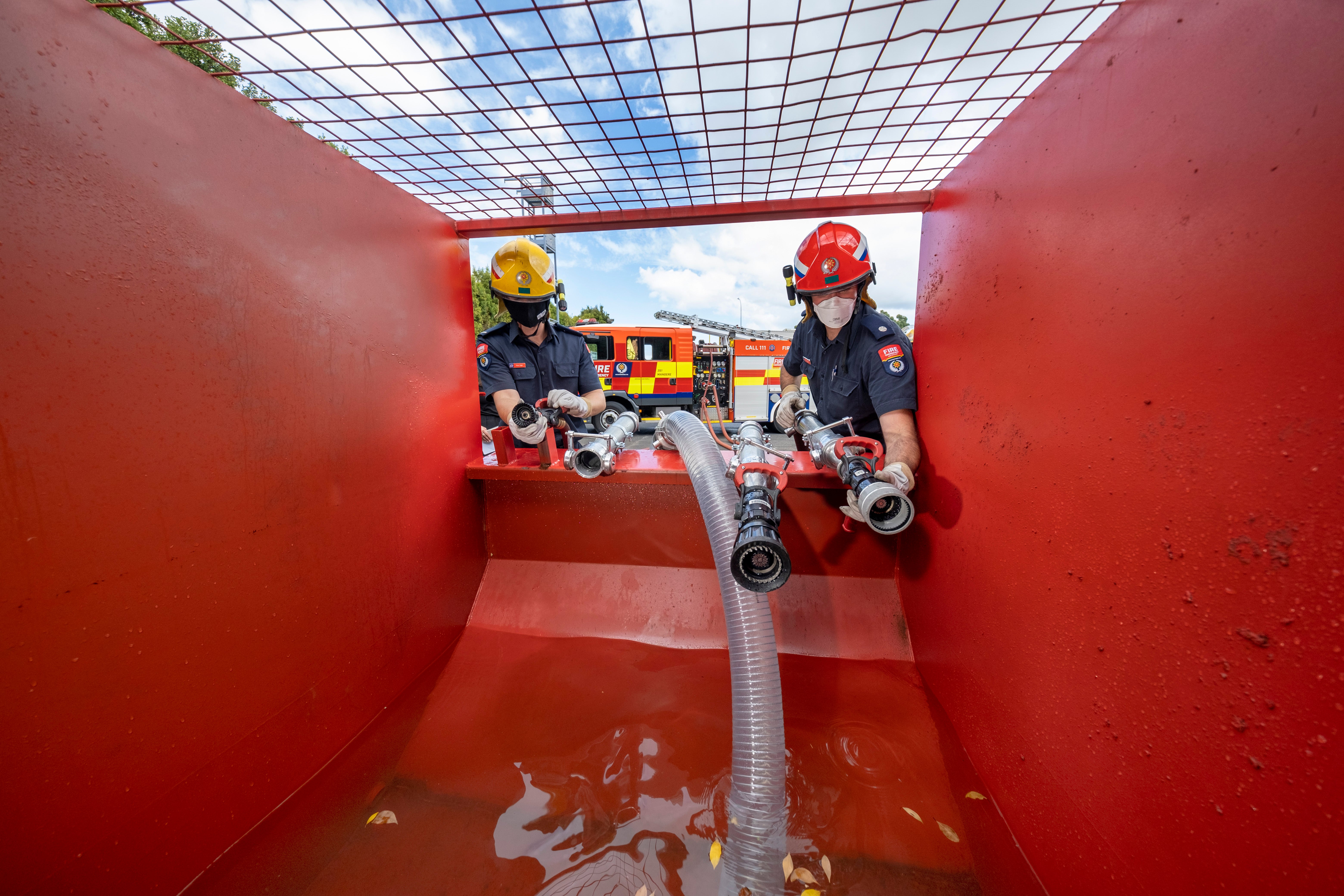 Auckland firefighters using recycled water in modified skip bins for training