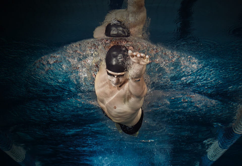 Australian Institute of Sport | man swimming | Devotion