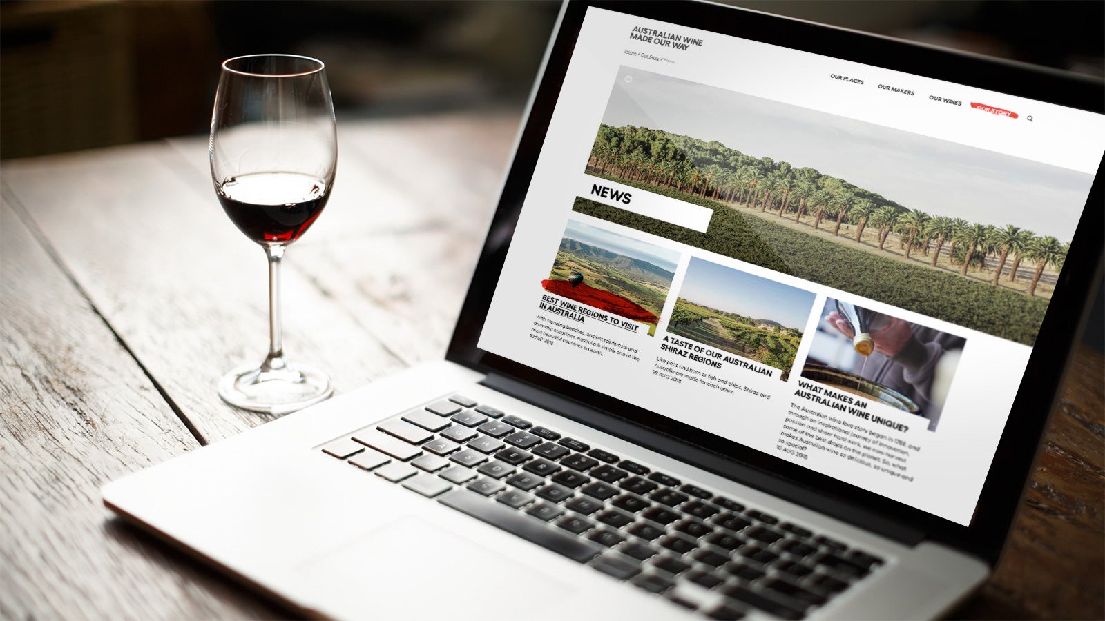 Australian Wine | website open on laptop next o a glass of red wine | Devotion