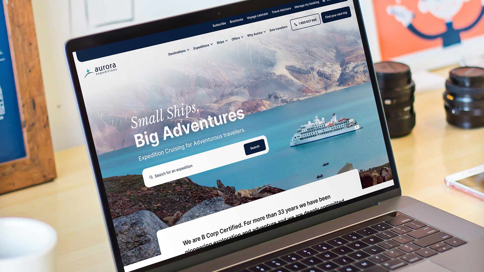 Aurora Expeditions | Aurora Expeditions website on a laptop sitting on a desk | Devotion